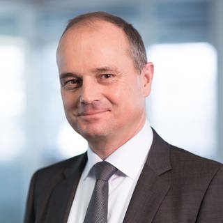 Dipl.-Kfm. Stefan Bäuerle, Geschäftsführer von SCALA MOTION GmbH und Taxifahrer.