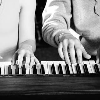 Klavier für vier Hände