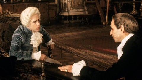 Tom Hulce & F. Murray Abraham als Mozart und Salieri im Film "Amadeus" von 1984.