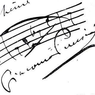 Autogramm und Notenblatt von Puccini