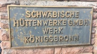 Schwäbische Hüttenwerk Gmbh Werk Königsbronn (Schild an Steinmauer)