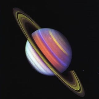 This psychedelic false-color view of Saturn from Voyager 2 reveals structure in the planet s banded clouds. 