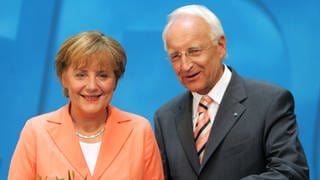 Angela Merkel und Edmund Stoiber am 30. Mai 2005 bei der Verkündung der Wahl Merkels zur Kanzlerkandidatin in Berlin