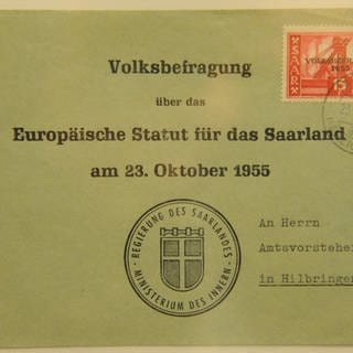 Briefumschlag. Aufschrift: Volksbefragung über das Europäische Statut für das Saarland am 23. Oktober 1955