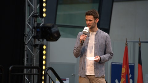 Marcel Fehr auf der Bühne bei der CMT in Stuttgart