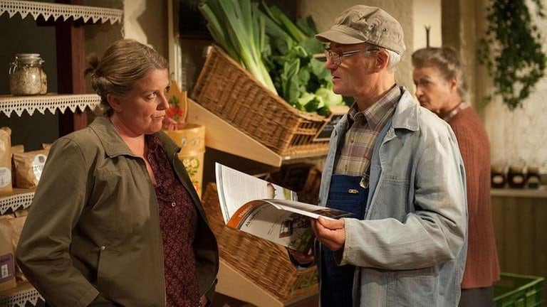 Evelyn, Karl und Johanna im Hofladen