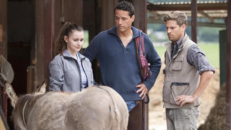 Jenny, Matthias und Andreas mit Esel Doudou auf dem Gestüt