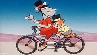 Äffle und Pferdle fahren auf einem Tandem