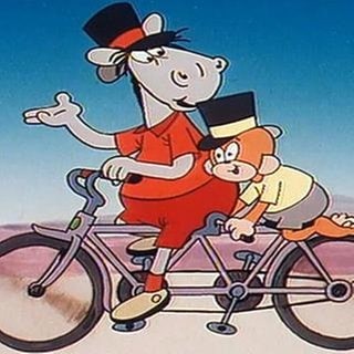 Äffle und Pferdle fahren auf einem Tandem