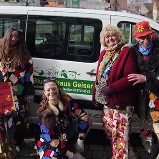 Floristen-Familie Geiser verkleidet an Fasching