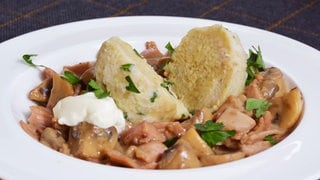 Knödel auf Pilzen