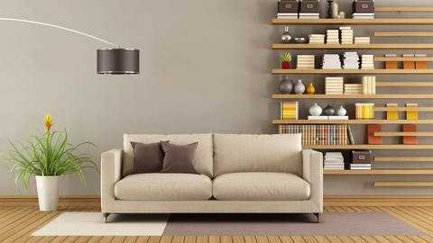 Wohnzimmer mit Sofa als Mittelpunkt