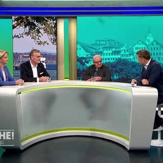 Moderator Florian Weber mit Gästen