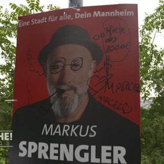 Beschmiertes Wahlplakat