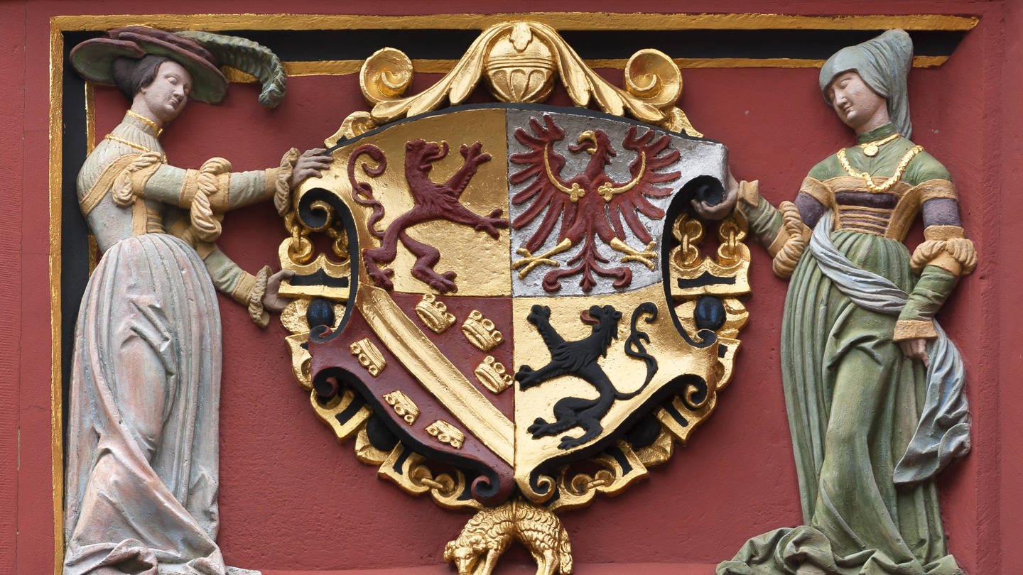 Habsburgisches Wappen am Historischen Kaufhaus (1520) in Freiburg: Der Ausdruck 