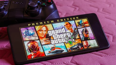 Zu sehen ist ein Bildschirm, auf dem das Spiel Grand Theft Auto 5 angezeigt wird, tags: Gewalt, Videospiel, Empatie